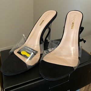 Clear and black stilettos